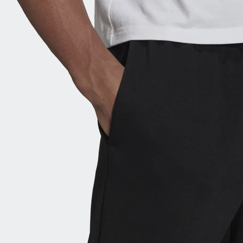 ADIDAS SPORTSWEAR PANTALONI ESSENTIALS FRENCH TERRY TAPERED ELASTIC CUFF LOGO - immagine 5